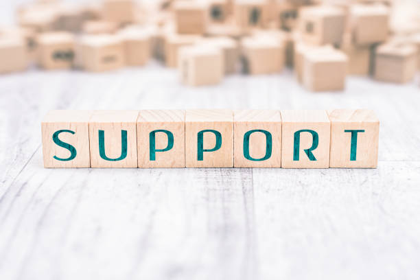 Support spelled out in tiles